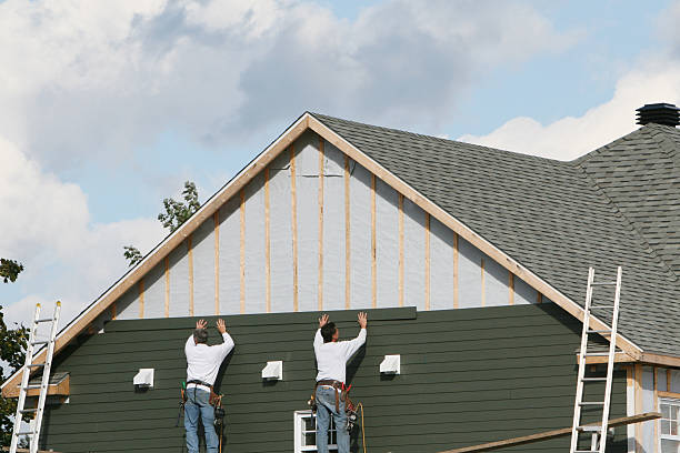 Professional Storm Damage Siding Repair technician working in Dayton, NJ